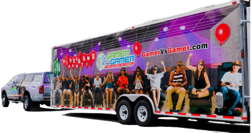 A 30ft VIP Atlanta Gaming Truck Pulled By A Pickup Truck Delivering A Complete Birthday Party To Your Doors